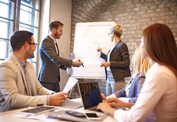 Business team presenting SEO strategy during an office meeting