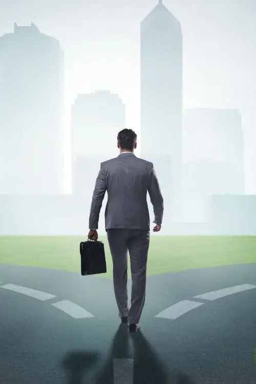 Businessman choosing a path toward growth, symbolizing strategic decisions