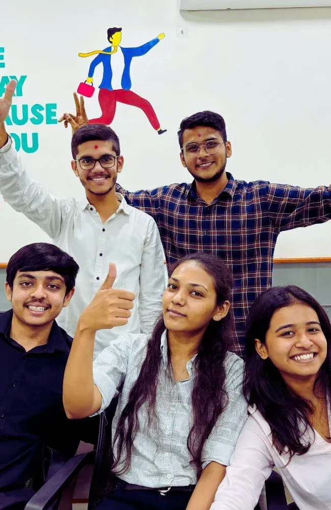 Adept Digitals team having a fun candid moment at the office