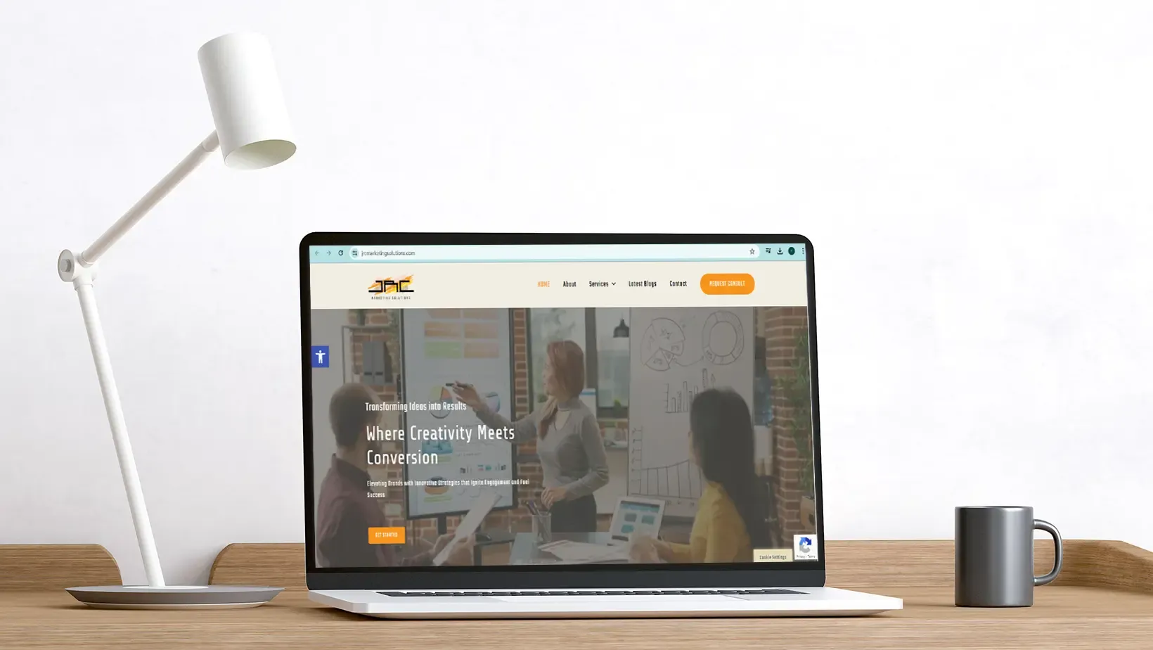 Laptop mockup of JAC Marketing Solutions website by Adept Digitals