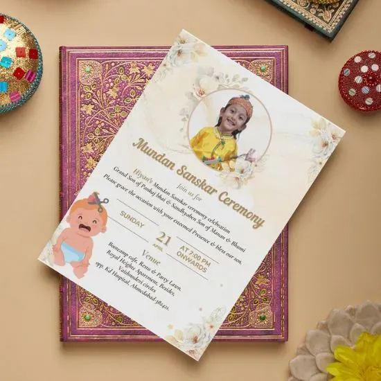 Mundan Sanskar ceremony invitation card flat lay design
