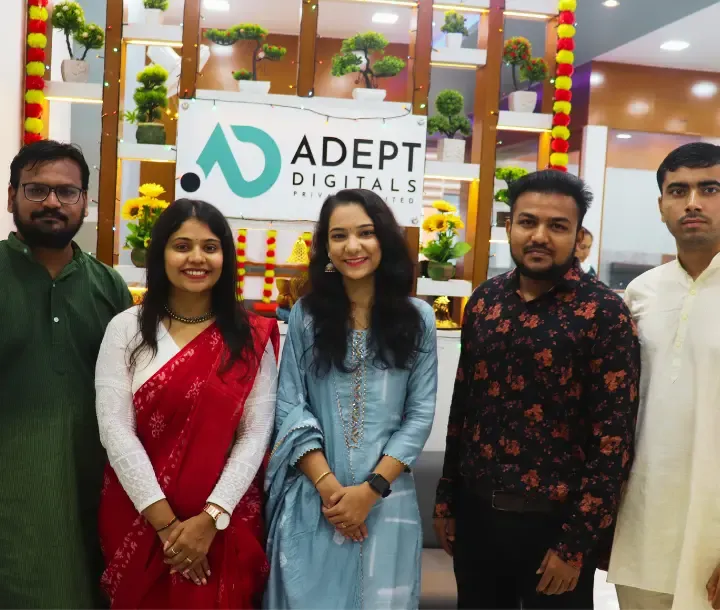 Adept Digitals team celebrating at a festive office event