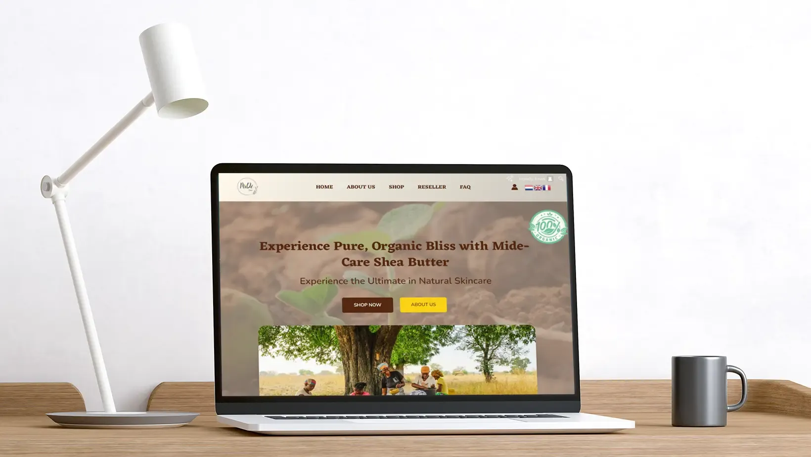 Laptop mockup of organic shea butter e-commerce site by Adept Digitals