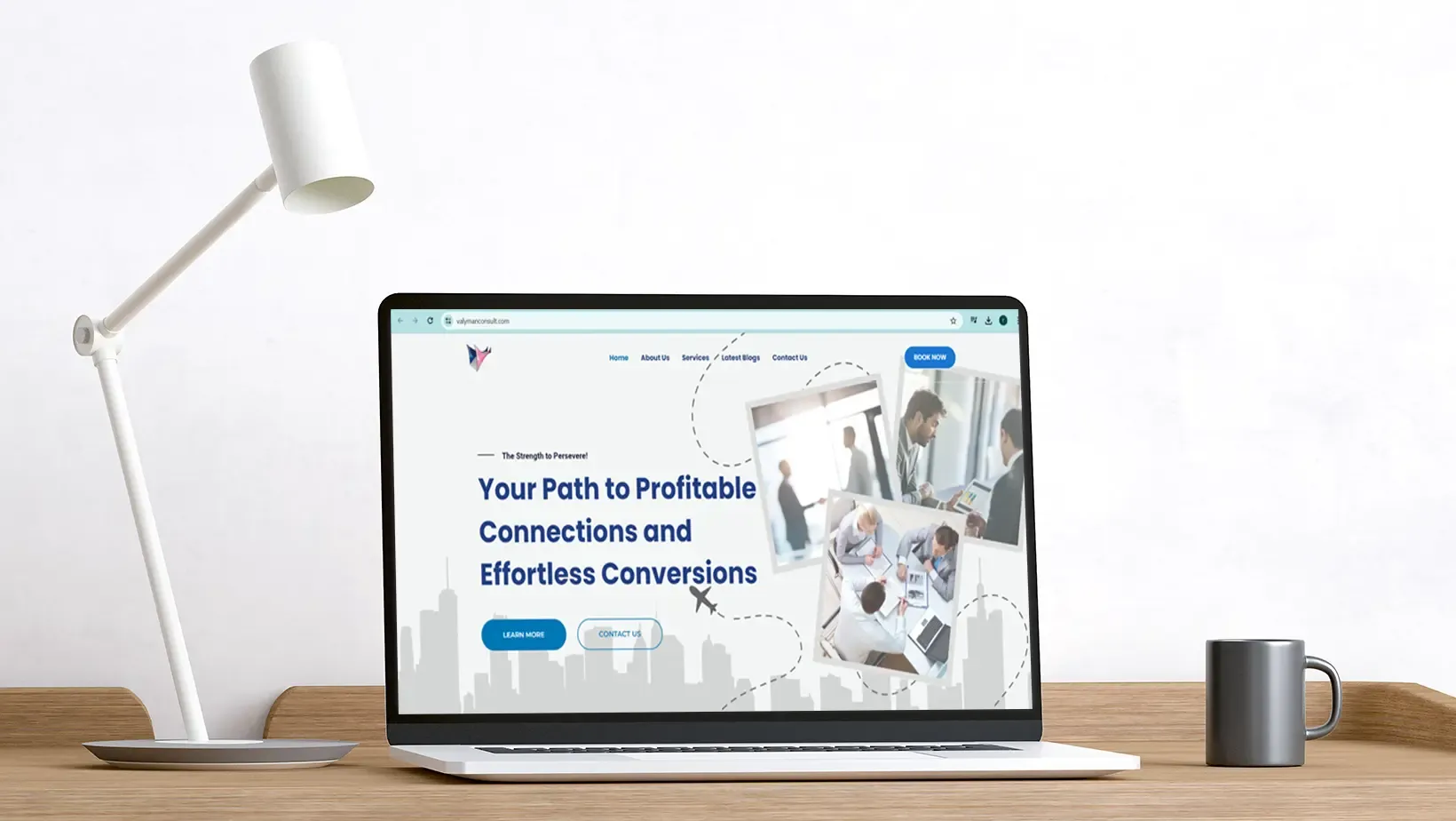 Laptop mockup of Valyman Consult business website designed by Adept Digitals